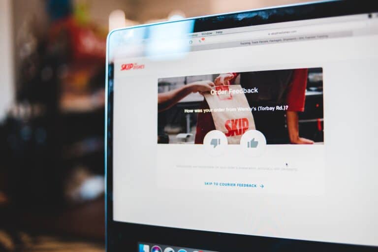 A laptop screen displaying an online shopping cart.